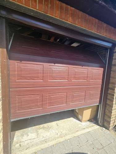 Used brown woodgrain sectional - used,